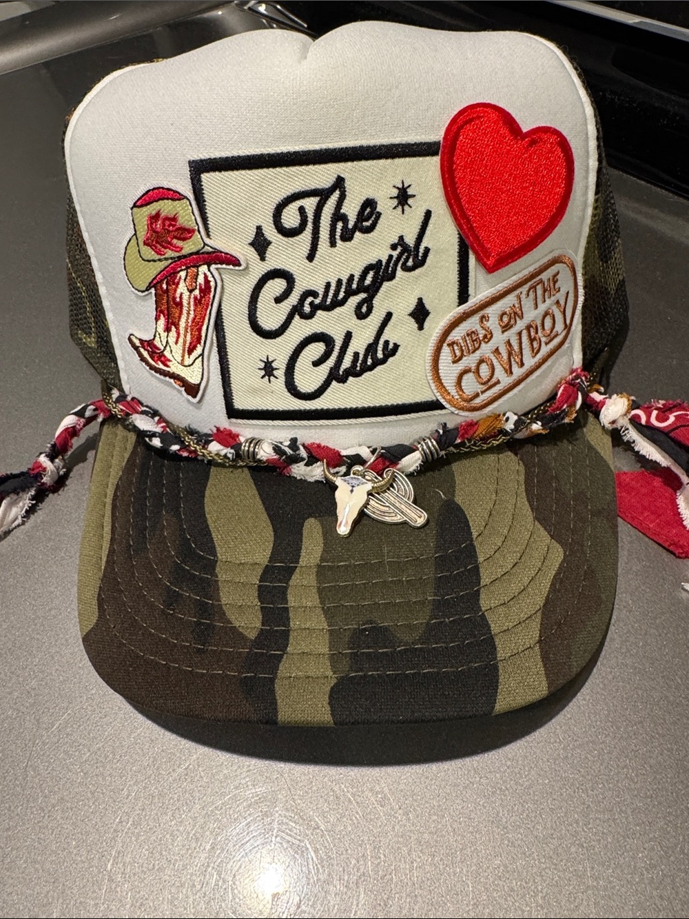 The Cowgirl Club Kids Camouflage Trucker Hat with Heart Patch